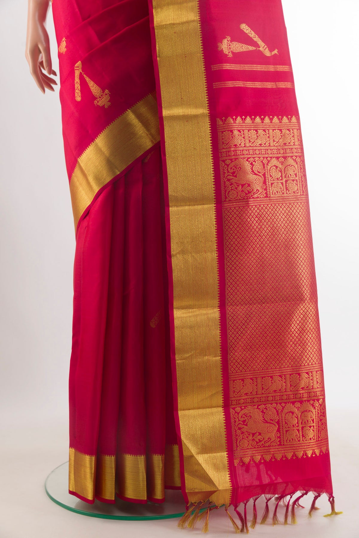 Pleats and pallu of Pure Silk Red Kanjivaram Saree with Zari Butta on the body and Zari Border. 