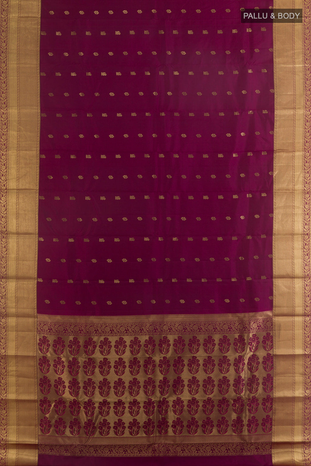 Flat view of Pure Silk Maroon Kanchipuram Saree with Zari Butta on the body and Zari Border. 