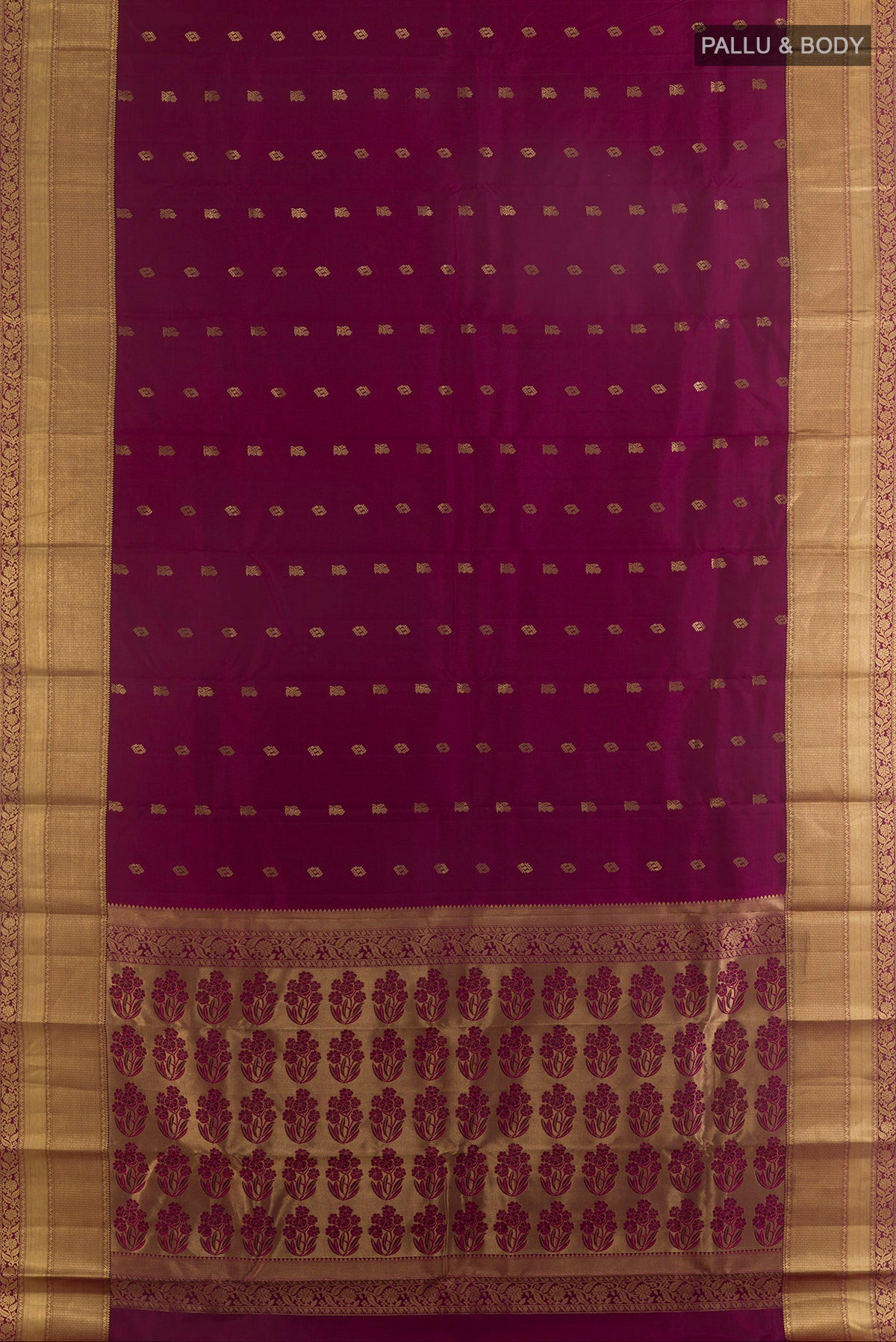Flat view of Pure Silk Maroon Kanchipuram Saree with Zari Butta on the body and Zari Border. 