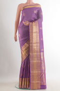 Pure Silk Lavender Kanchipuram Saree with Zari Butta on the body and Zari Border.  displayed on a mannequin