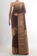 Pure Silk Coffee Brown Kanchipuram Saree with Zari Butta on the body and Zari Border.  displayed on a mannequin