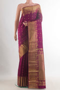 Pure Silk Burgundy Kanchipuram Saree with Zari Butta on the body and Zari Border.  displayed on a mannequin