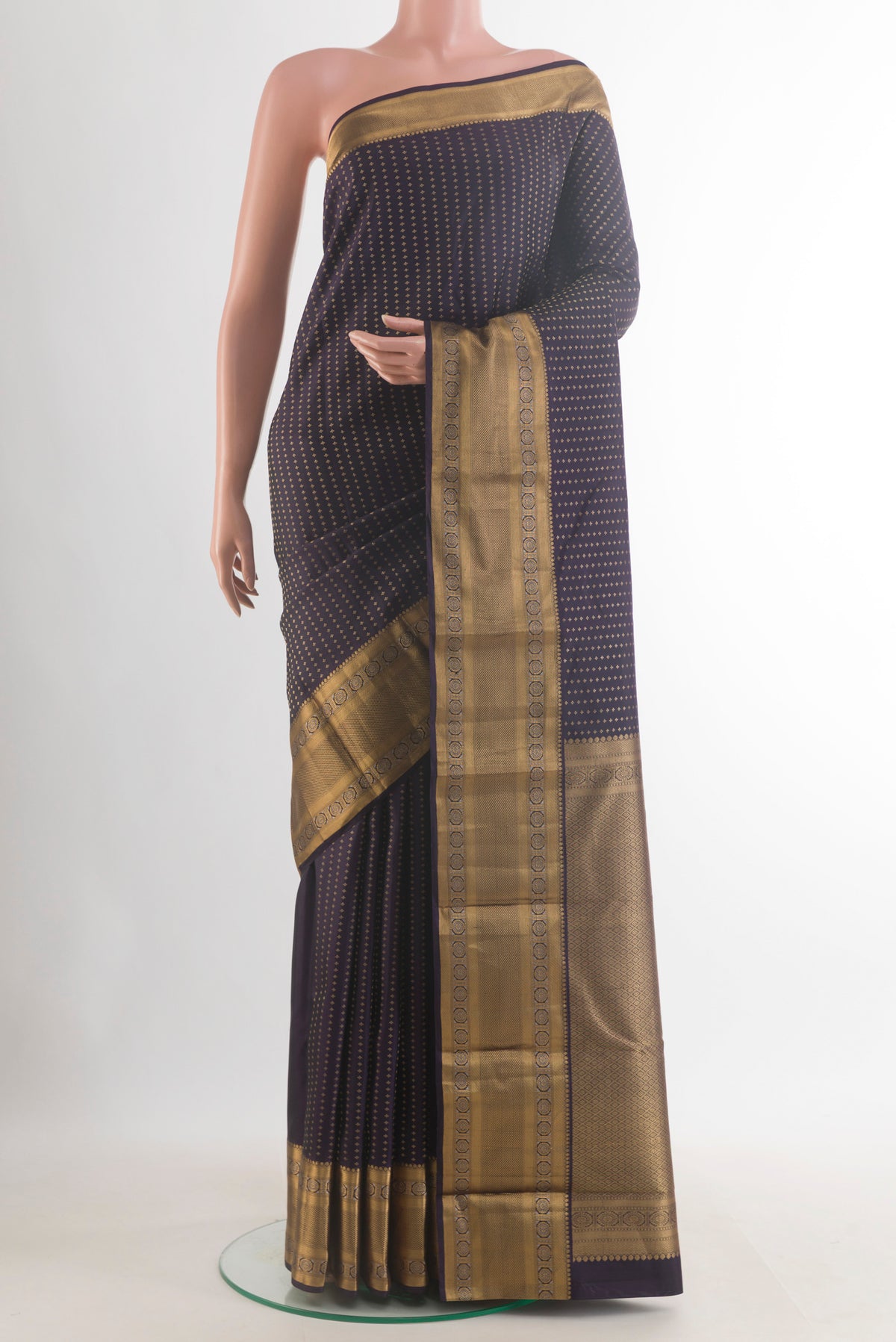 Pure Silk Dark Blue Kanjivaram Saree with Zari Butta on the body and Zari Border.  displayed on a mannequin