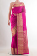 Pure Silk Pink Kanjivaram Saree with Jacquard With Zari Butta on the body and Zari Border.  displayed on a mannequin