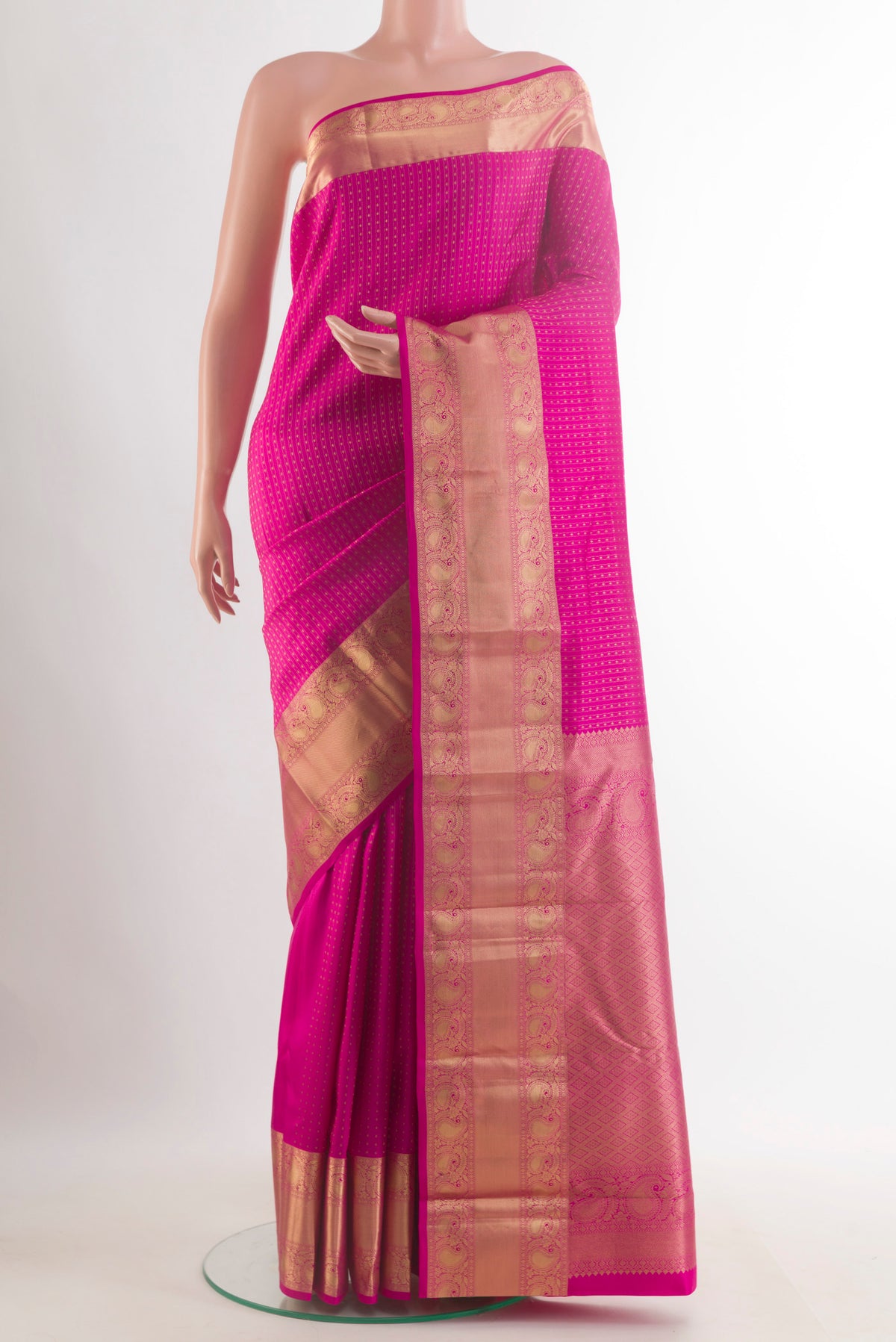 Pure Silk Pink Kanjivaram Saree with Jacquard With Zari Butta on the body and Zari Border.  displayed on a mannequin