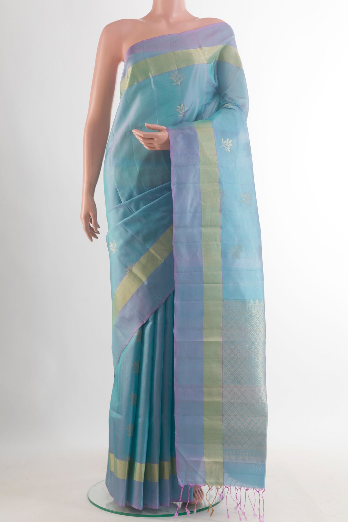 Pure Silk Light Blue Kanjivaram Saree with Zari Butta on the body and Zari Border.  displayed on a mannequin