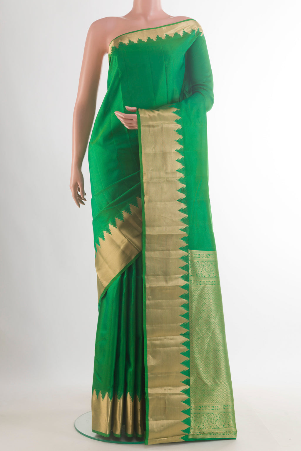 Pure Silk Green Kanchipuram Saree with Plain Body and Zari Border.  displayed on a mannequin