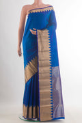 Pure Silk Royal Blue Kanchipuram Saree with Plain Body and Zari Border.  displayed on a mannequin