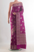 Purple Tussar Saree with Zari Butta on the body and Zari Border.  displayed on a mannequin