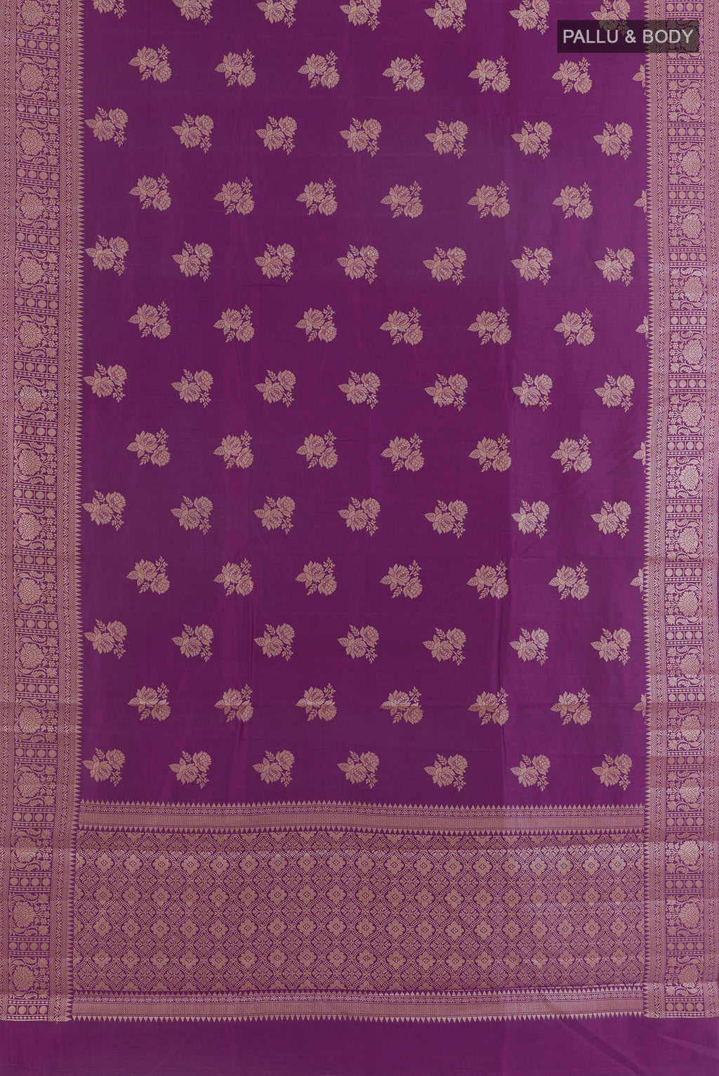 Flat view of Purple Tussar Saree with Zari Butta on the body and Zari Border. 