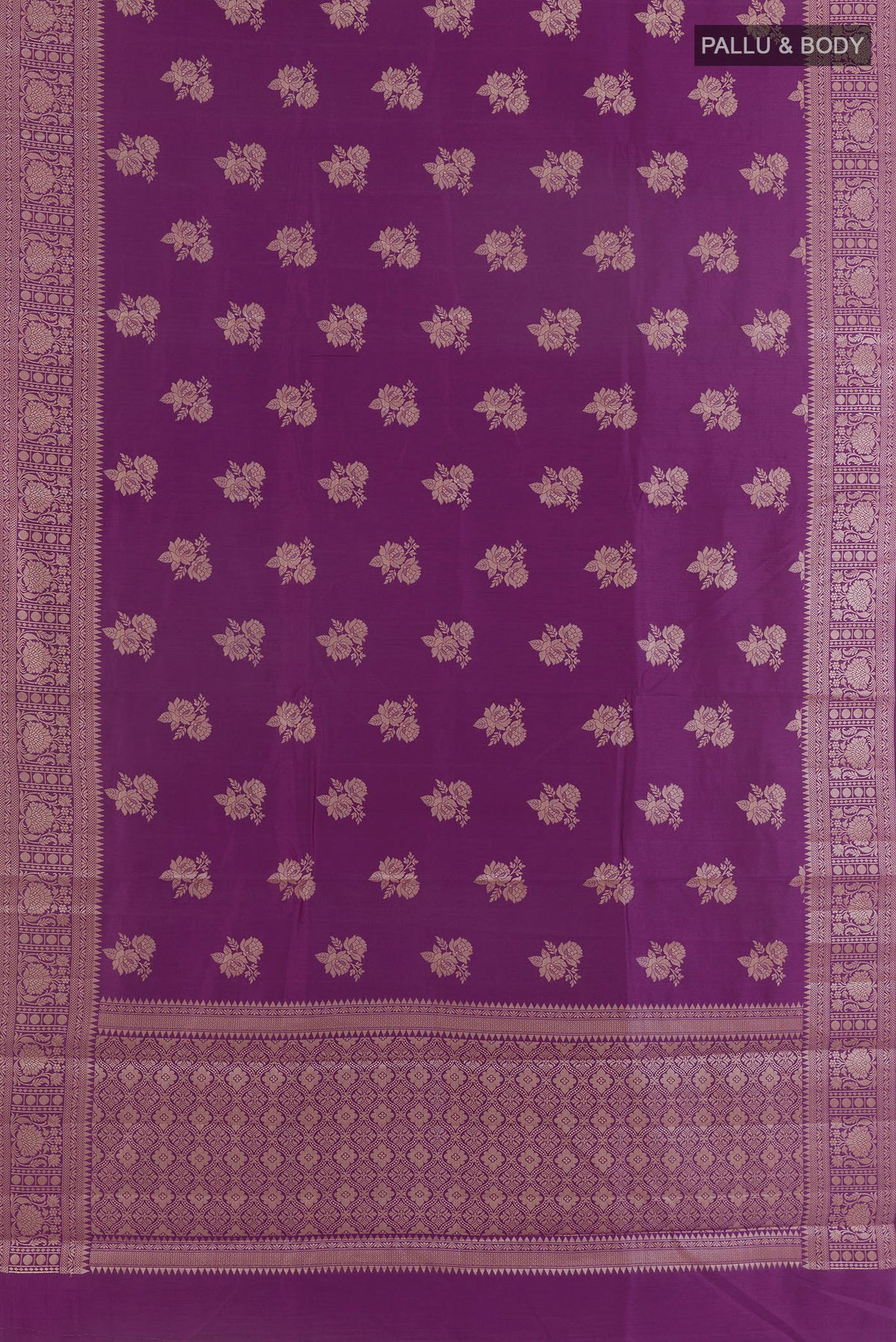 Flat view of Purple Tussar Saree with Zari Butta on the body and Zari Border. 