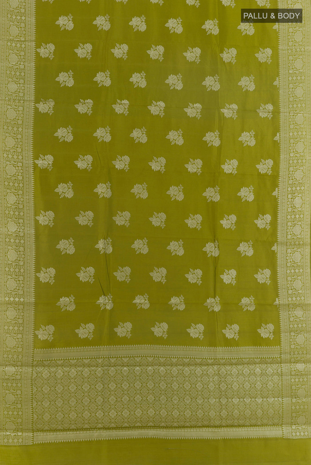 Flat view of Mehandi Green Tussar Saree with Zari Butta on the body and Zari Border. 