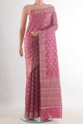 Pink Tussar Saree with Zari Butta on the body and Zari Border.  displayed on a mannequin