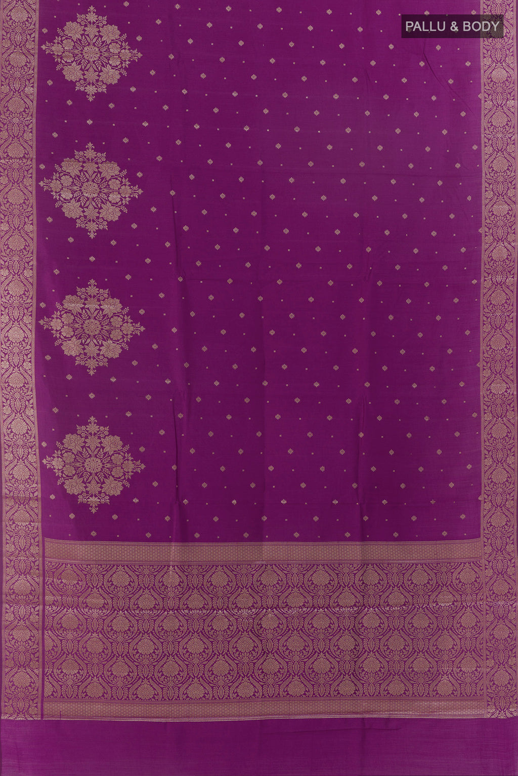 Flat view of Purple Tussar Saree with Zari Butta on the body and Zari Border. 
