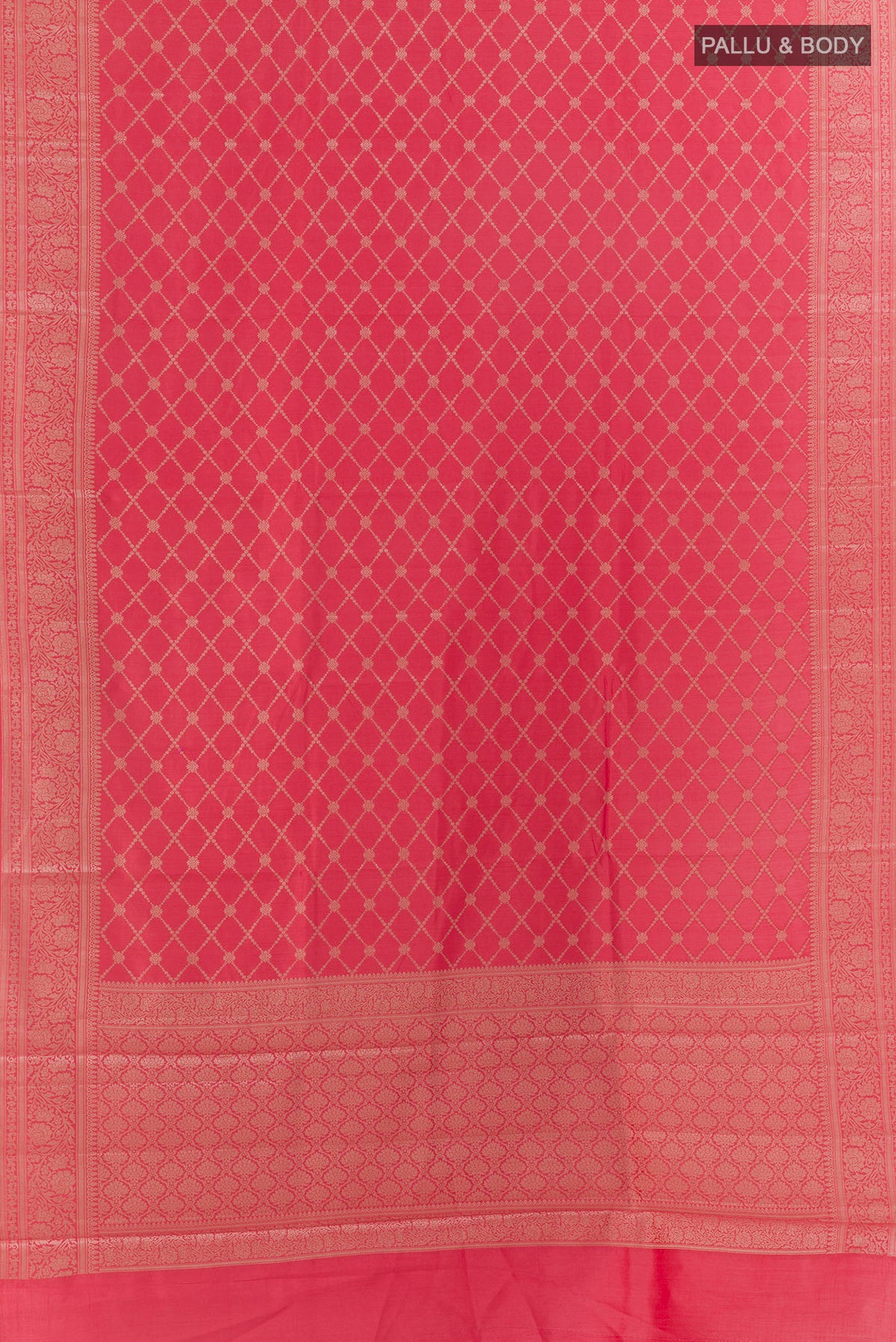 Flat view of Coral Tussar Saree with Zari Brocade on the body and Zari Border. 