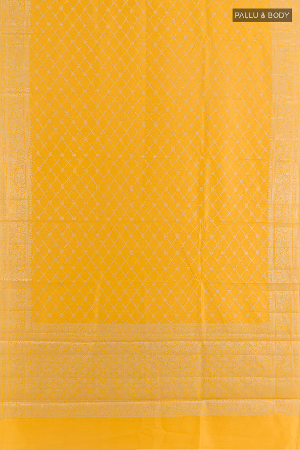 Flat view of Yellow Tussar Saree with Zari Brocade on the body and Zari Border. 