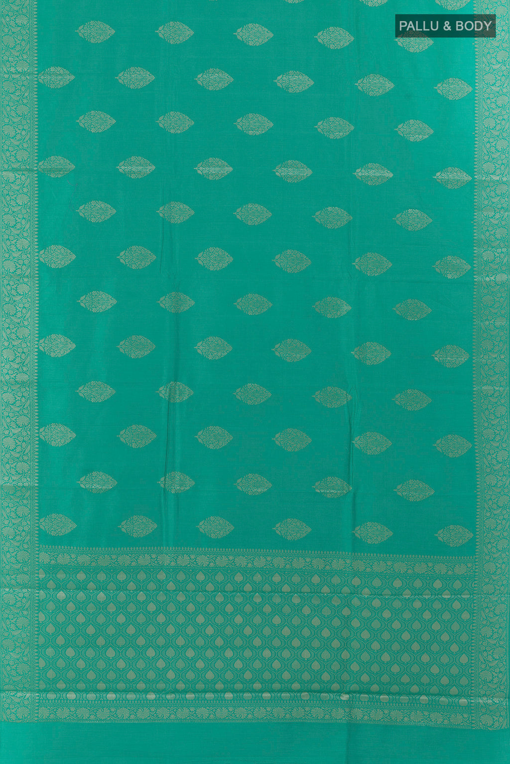 Flat view of Sea Green Tussar Saree with Zari Butta on the body and Zari Border. 
