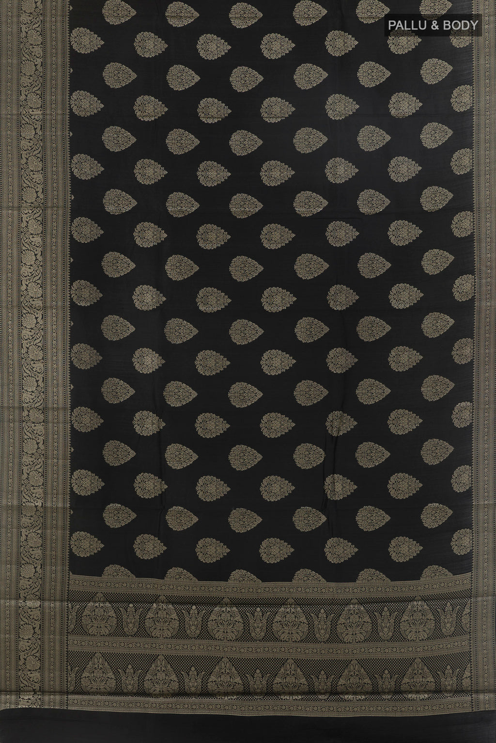 Flat view of Black Tussar Saree with Zari Butta on the body and Zari Border. 