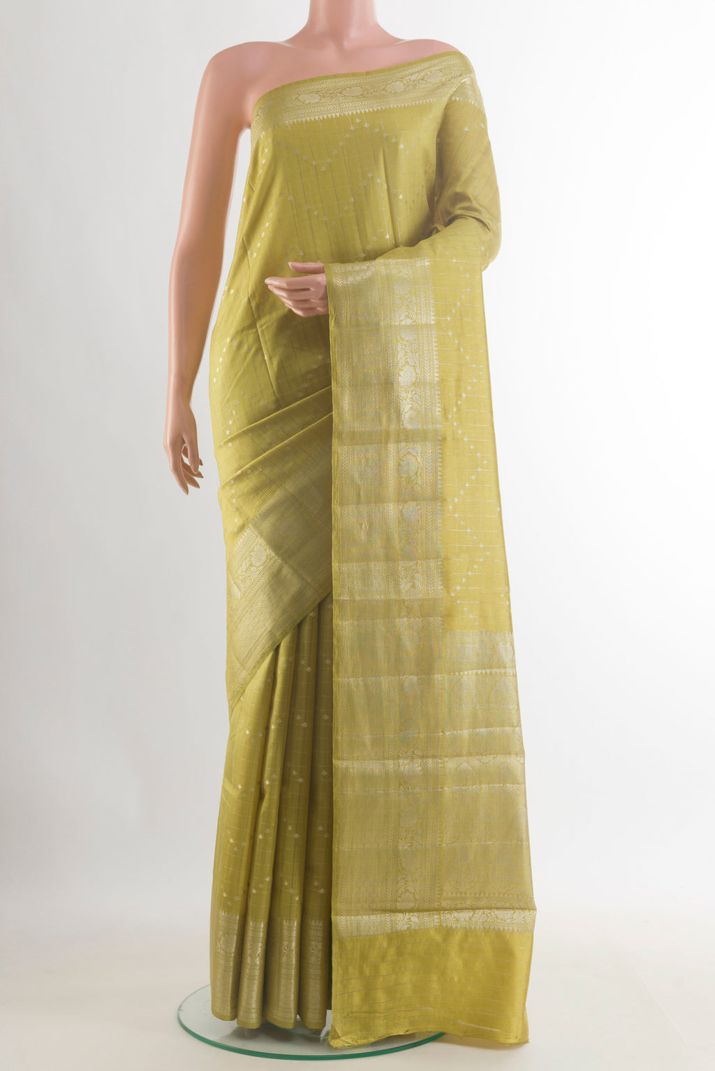 Lemon Yellow Tussar Saree with Zari Butta on the body and Zari Border.  displayed on a mannequin
