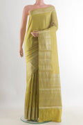Lemon Yellow Tussar Saree with Zari Butta on the body and Zari Border.  displayed on a mannequin