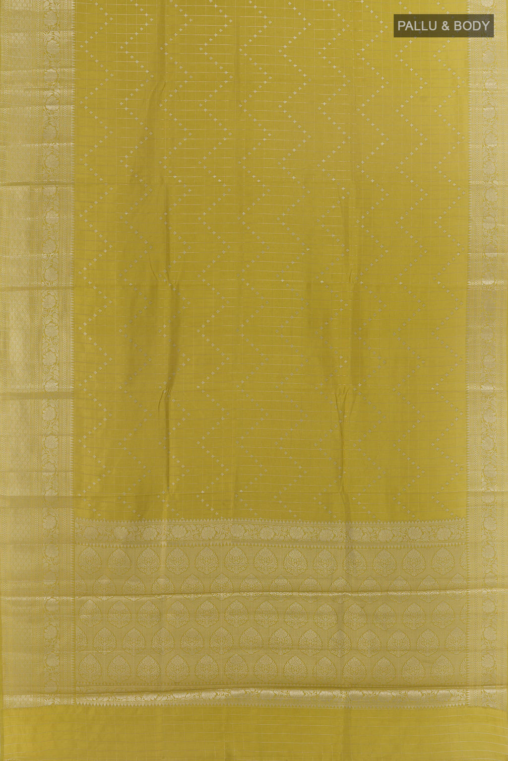 Flat view of Lemon Yellow Tussar Saree with Zari Butta on the body and Zari Border. 