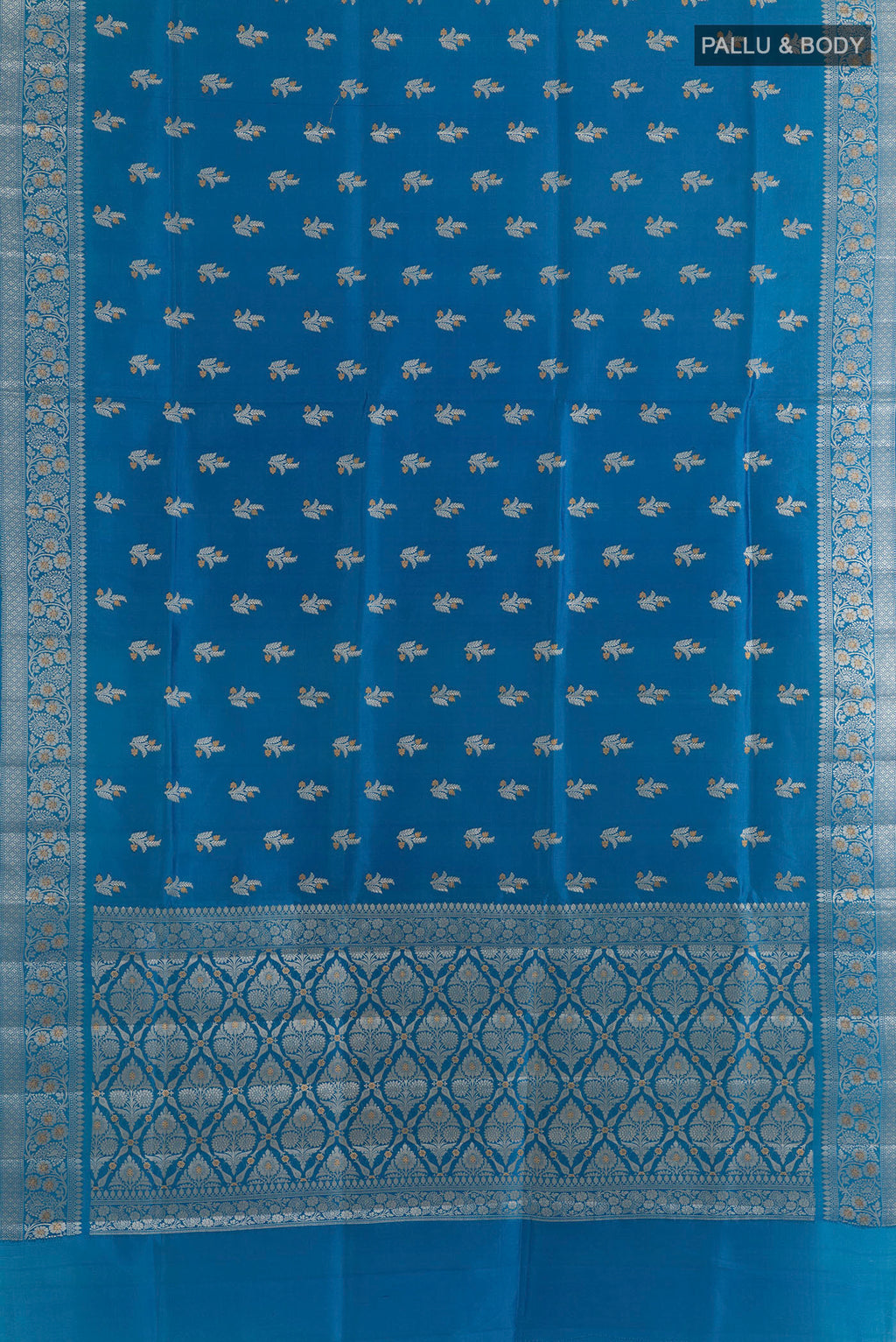 Flat view of Pure Silk Blue Banarasi Raw Saree with Zari Brocade on the body and Zari Border. 