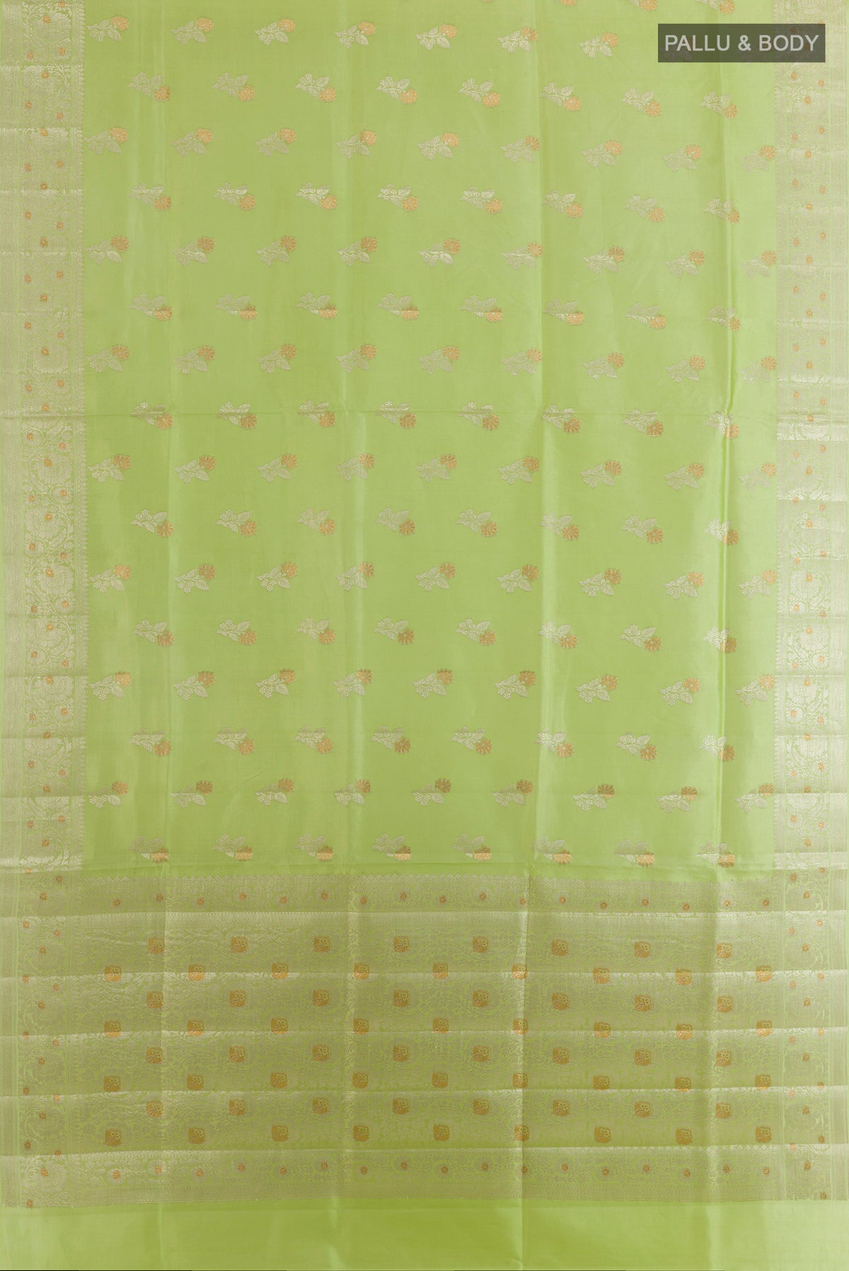 Flat view of Pure Silk Pista Green Banarasi Raw Saree with Zari Butta on the body and Zari Border. 