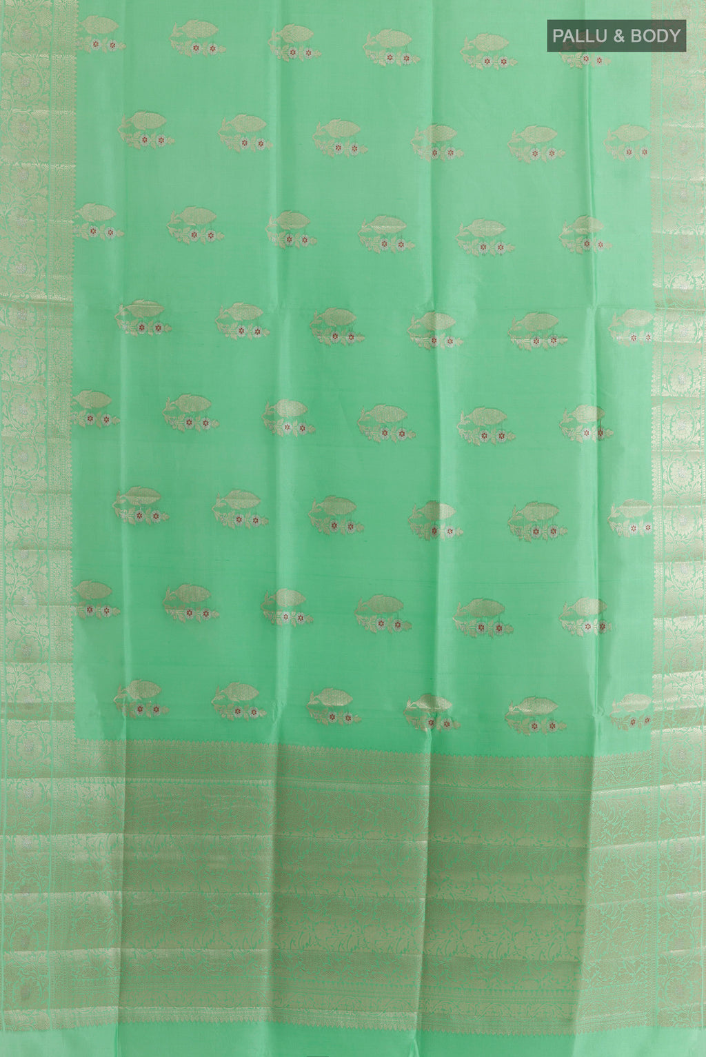 Flat view of Pure Silk Green Banarasi Raw Saree with Zari Butta on the body and Zari Border. 
