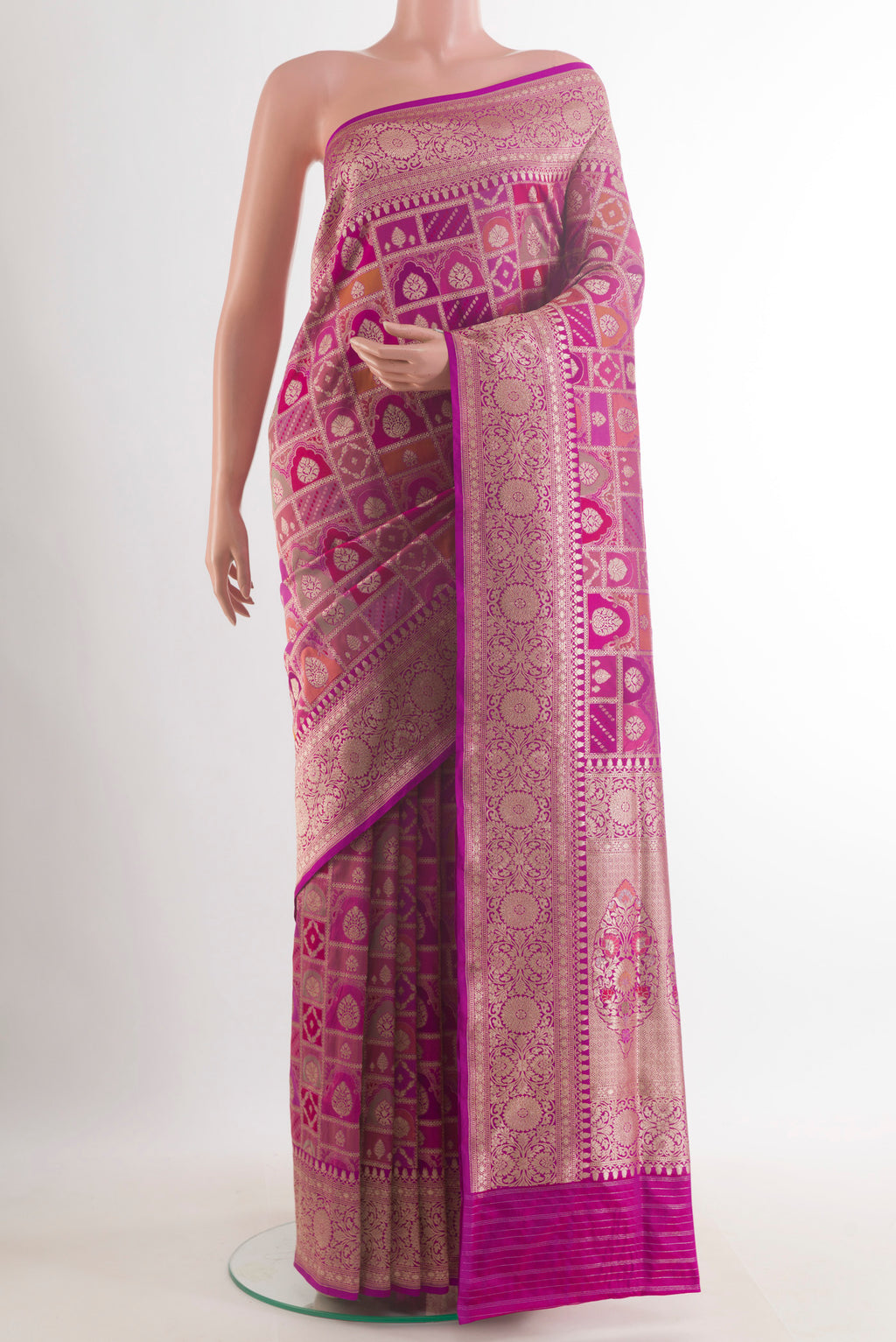 Pure Silk Magenta Banarasi Saree with Zari Brocade on the body and Zari Border.  displayed on a mannequin