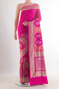 Pure Silk Pink Banarasi Saree with Zari Brocade on the body and Zari Border.  displayed on a mannequin