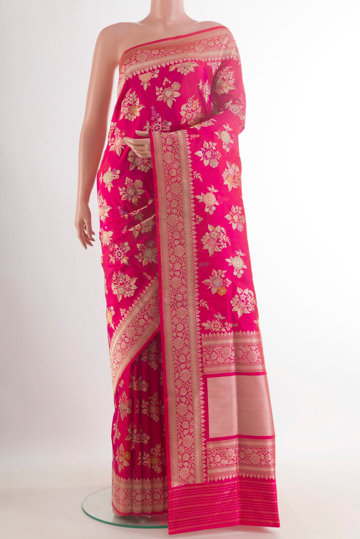 Pure Silk Pink Banarasi Saree with Zari Brocade on the body and Zari Border.  displayed on a mannequin