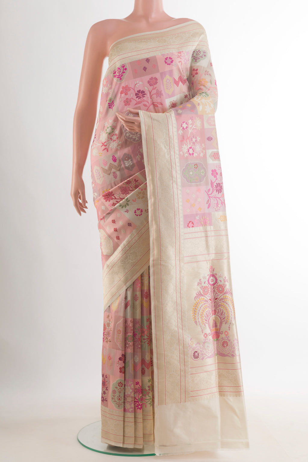 Pure Silk Peach Banarasi Saree with Zari And Thread Butta on the body and Zari Border.  displayed on a mannequin