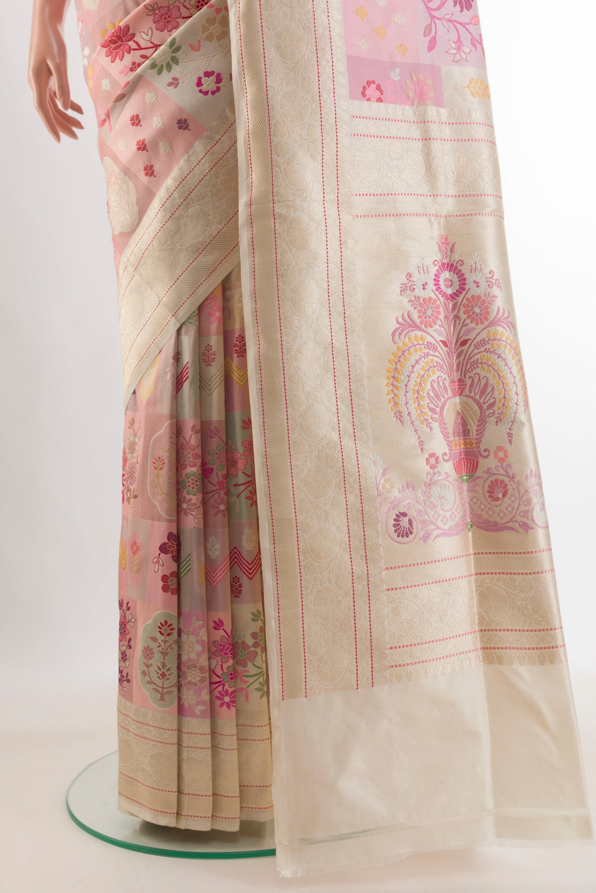 Pleats and pallu of Pure Silk Peach Banarasi Saree with Zari And Thread Butta on the body and Zari Border. 
