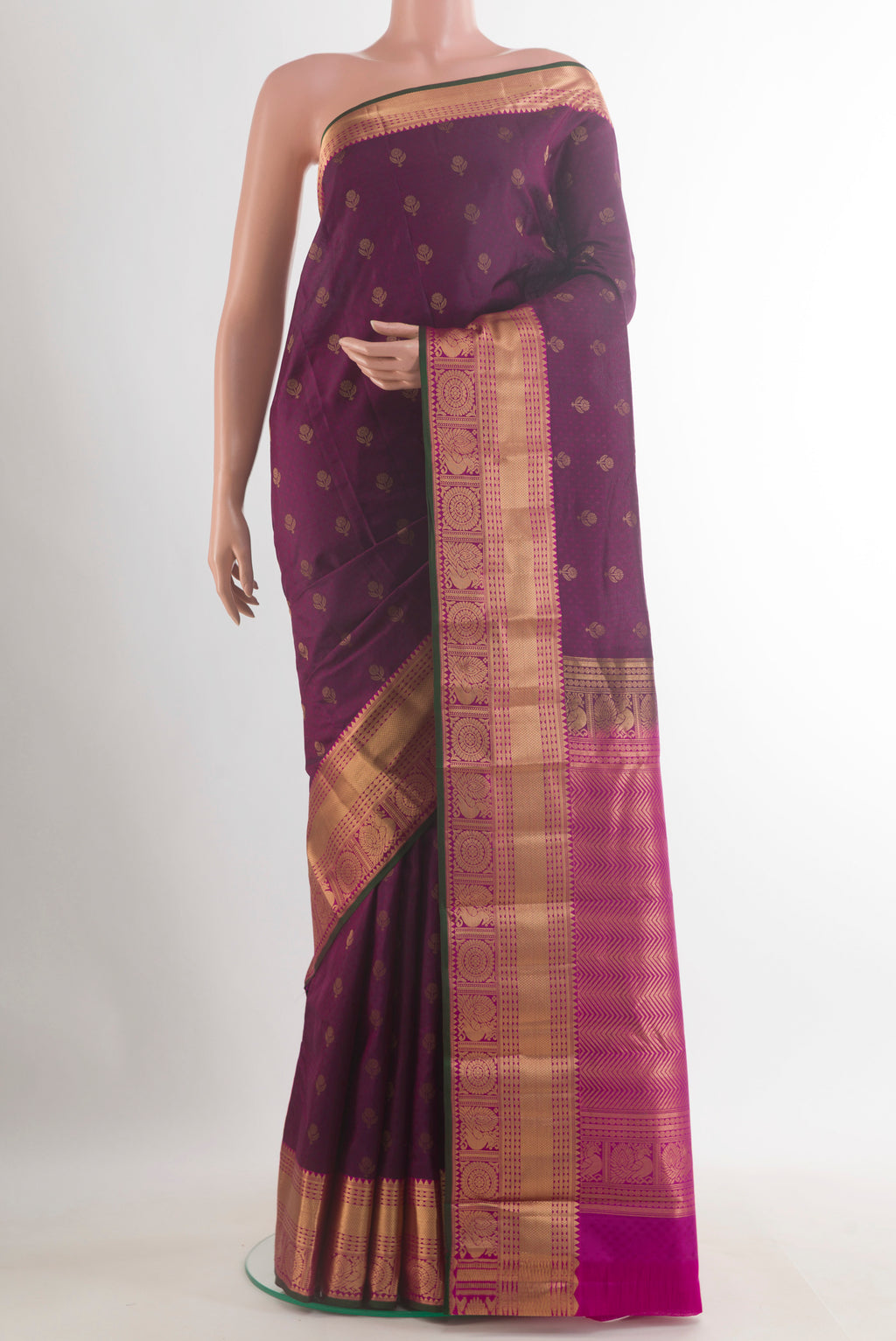 Pure Silk Purple Kanchipuram Saree with Jacquard With Zari Butta on the body and Zari Border.  displayed on a mannequin