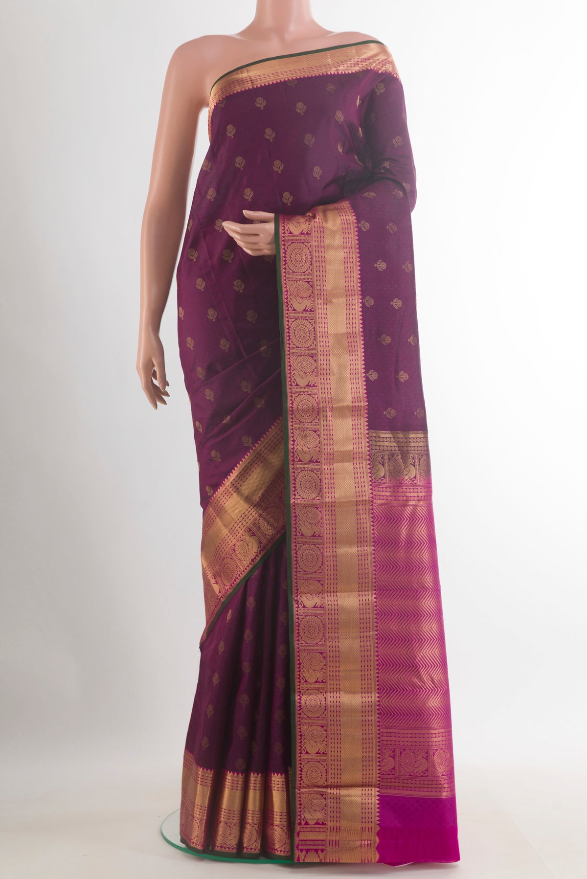 Pure Silk Purple Kanchipuram Saree with Jacquard With Zari Butta on the body and Zari Border.  displayed on a mannequin