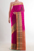 Pure Silk Pink Kanchipuram Saree with Jacquard With Zari Butta on the body and Zari Border.  displayed on a mannequin