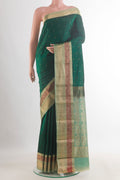 Pure Silk Bottle Green Kanchipuram Saree with Zari Butta on the body and Zari Border.  displayed on a mannequin