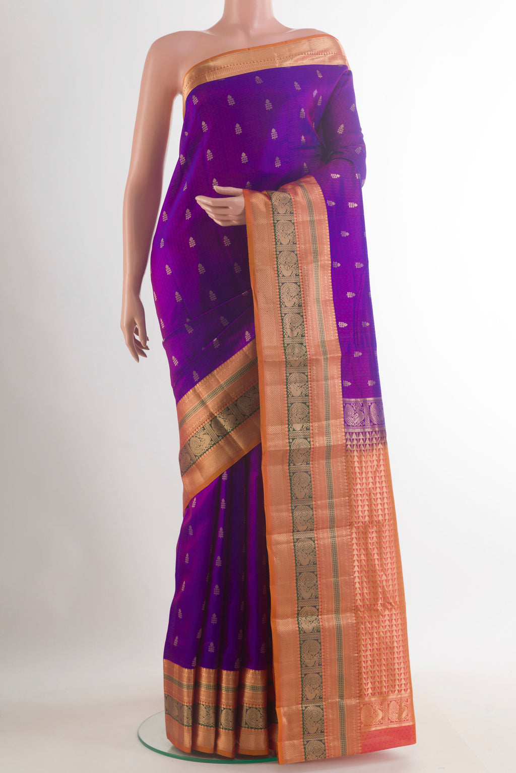 Pure Silk Purple Kanchipuram Saree with Jacquard With Zari Butta on the body and Zari Border.  displayed on a mannequin