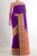 Pure Silk Purple Kanchipuram Saree with Jacquard With Zari Butta on the body and Zari Border.  displayed on a mannequin