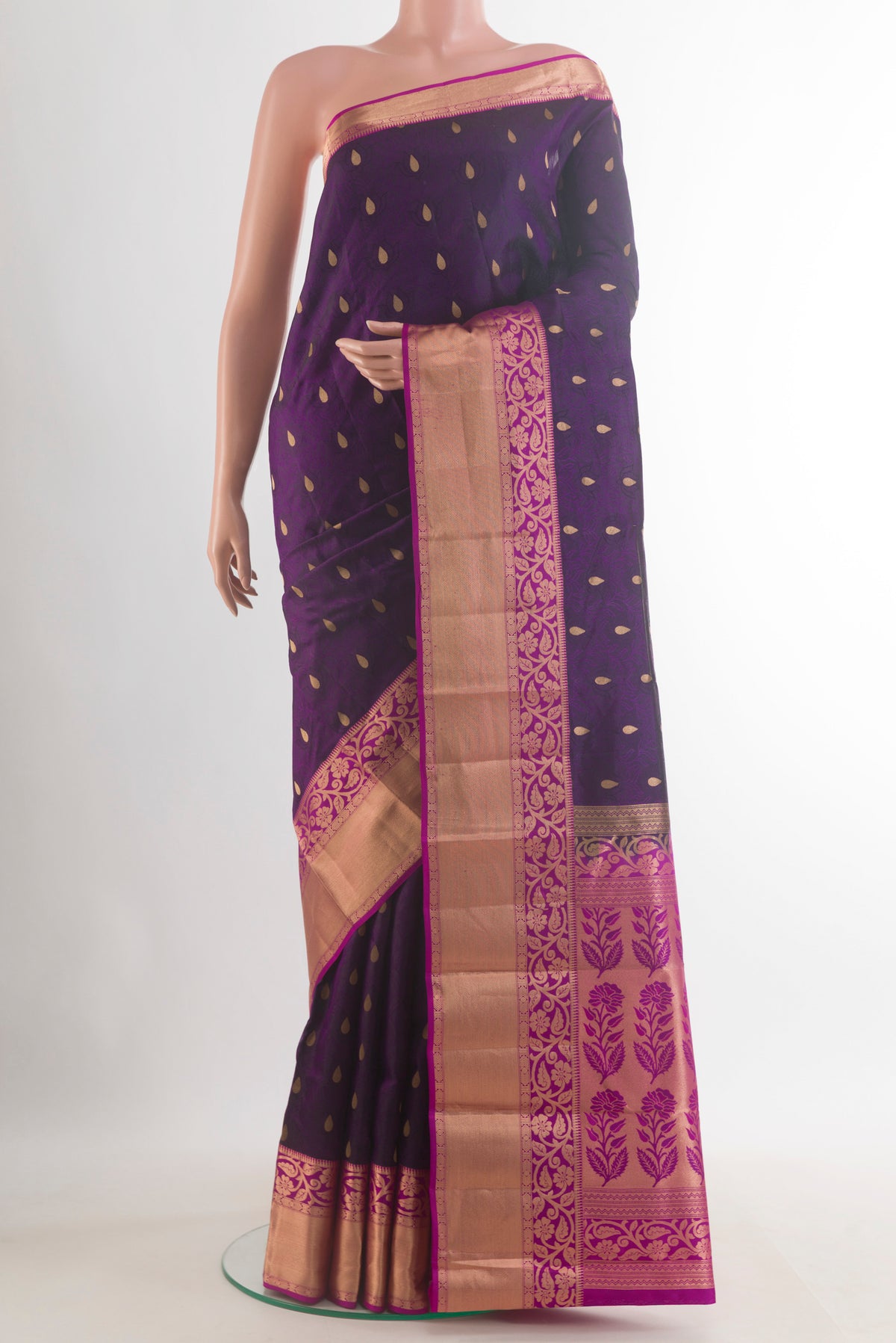 Pure Silk Purple Kanchipuram Saree with Jacquard With Zari Butta on the body and Zari Border.  displayed on a mannequin