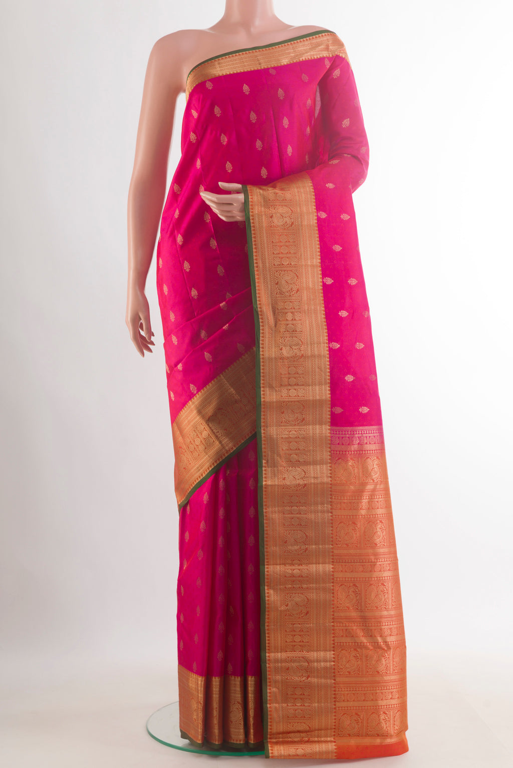 Pure Silk Pink Kanchipuram Saree with Jacquard With Zari Butta on the body and Zari Border.  displayed on a mannequin