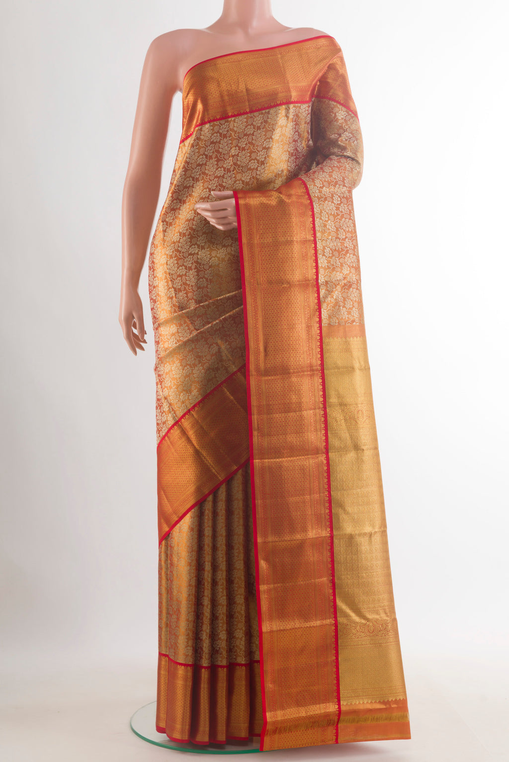 Golden Dual Tone Kanchipuram Tissue Saree with Zari Brocade on the body and Zari Border.  displayed on a mannequin
