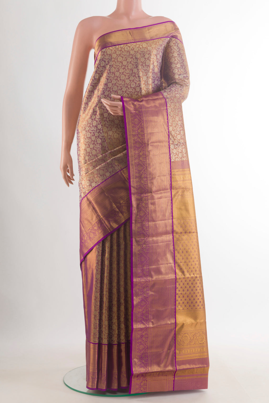 Lavender Dual Tone Kanchipuram Tissue Saree with Zari Brocade on the body and Zari Border.  displayed on a mannequin