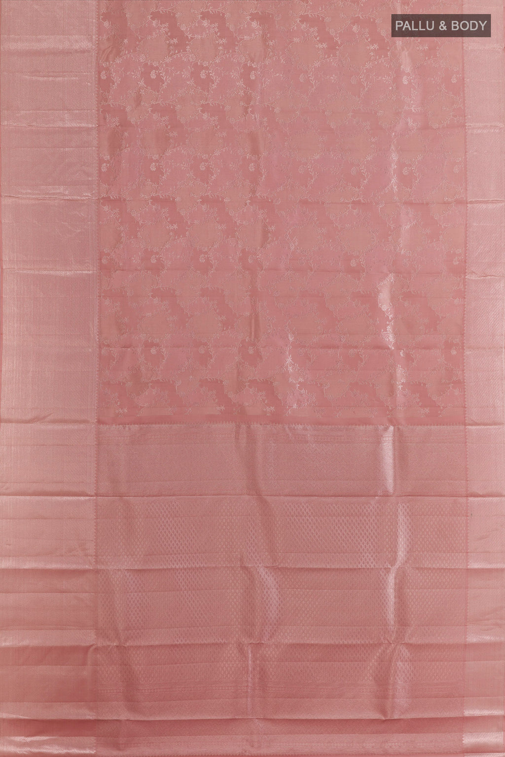 Flat view of Pure Silk Rose Gold Kanchipuram Saree with Zari Brocade on the body and Zari Border. 