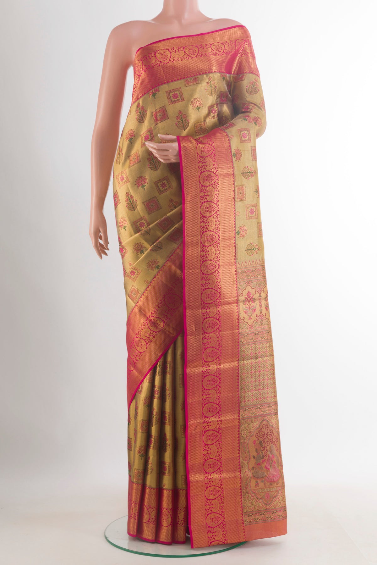 Golden Dual Tone Kanjivaram Tissue Saree with Zari Brocade on the body and Zari Border.  displayed on a mannequin