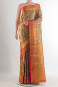Golden Dual Tone Kanjivaram Tissue Saree with Zari Brocade on the body and Zari Border.  displayed on a mannequin