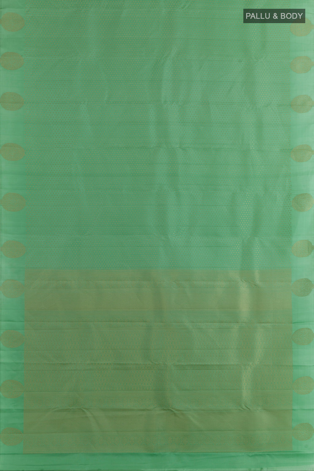 Flat view of Pure Silk Green Kanchipuram Saree with Zari Butta on the body and Zari Border. 