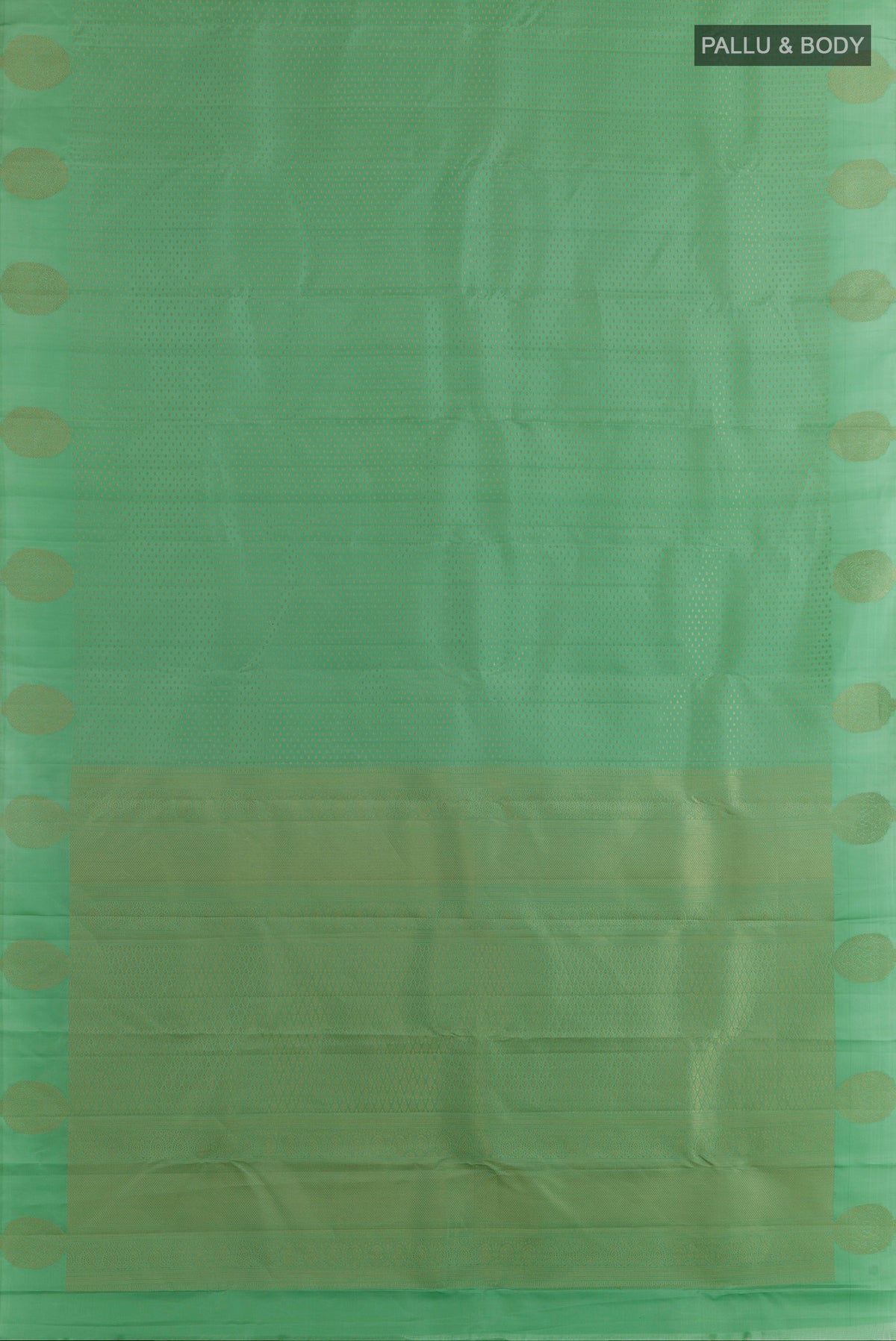 Flat view of Pure Silk Green Kanchipuram Saree with Zari Butta on the body and Zari Border. 