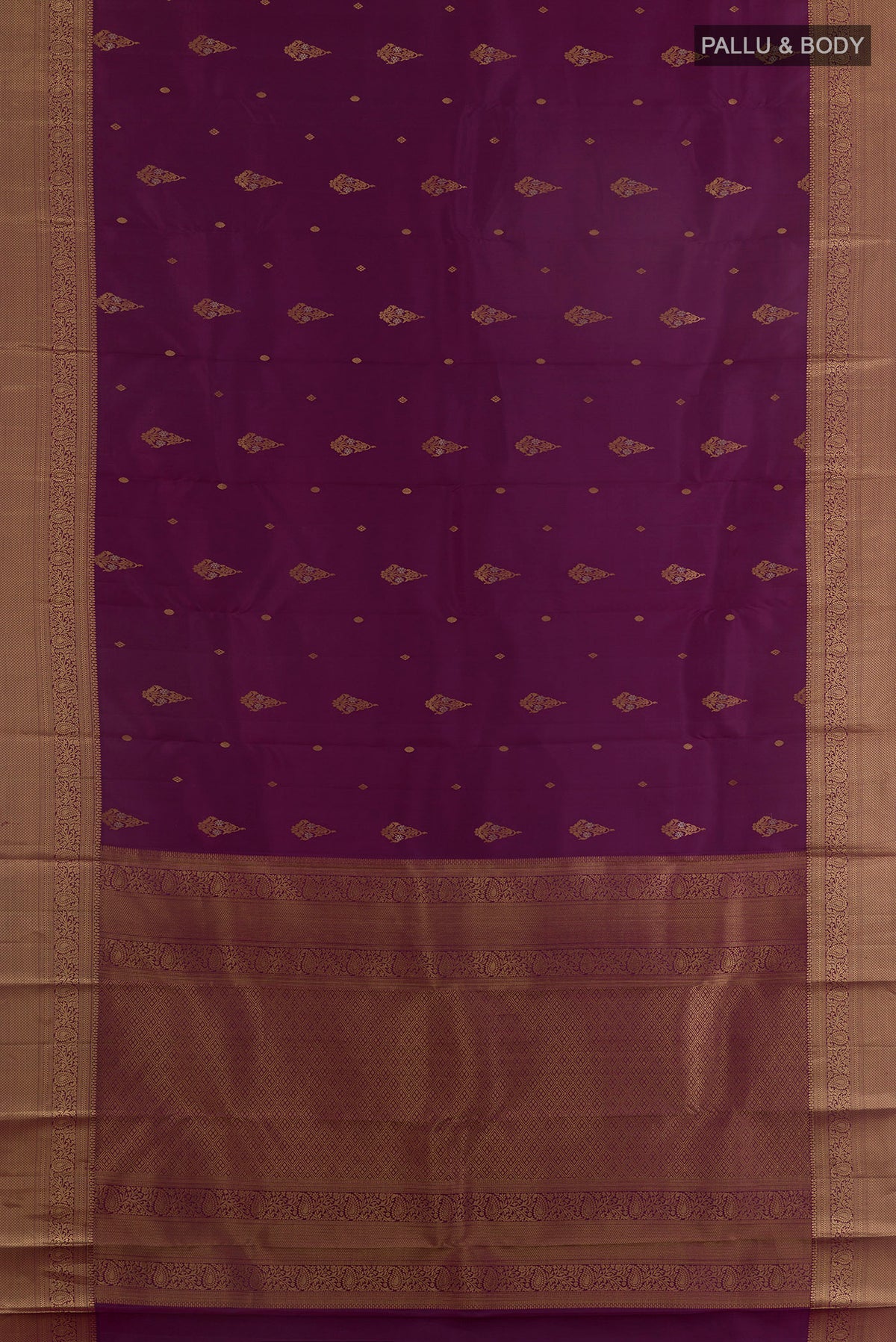 Flat view of Pure Silk Purple Kanjivaram Saree with Zari Butta on the body and Zari Border. 