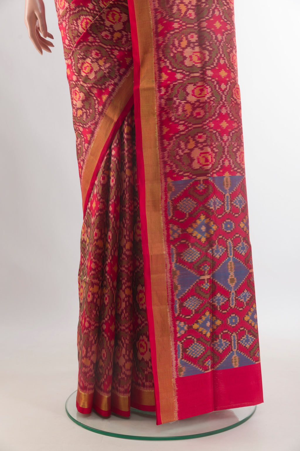 Pleats and pallu of Pure Silk Red Rajkot Patola Saree with Pure Ikat on the body and Zari Border. 
